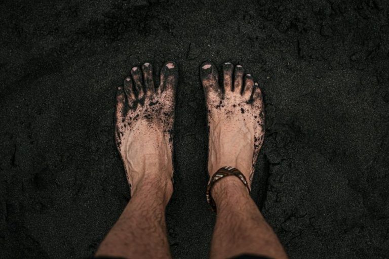 person with black nail polish